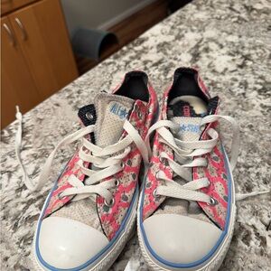 Converse All Star low-top sneakers featuring an all-over pink sheep print.